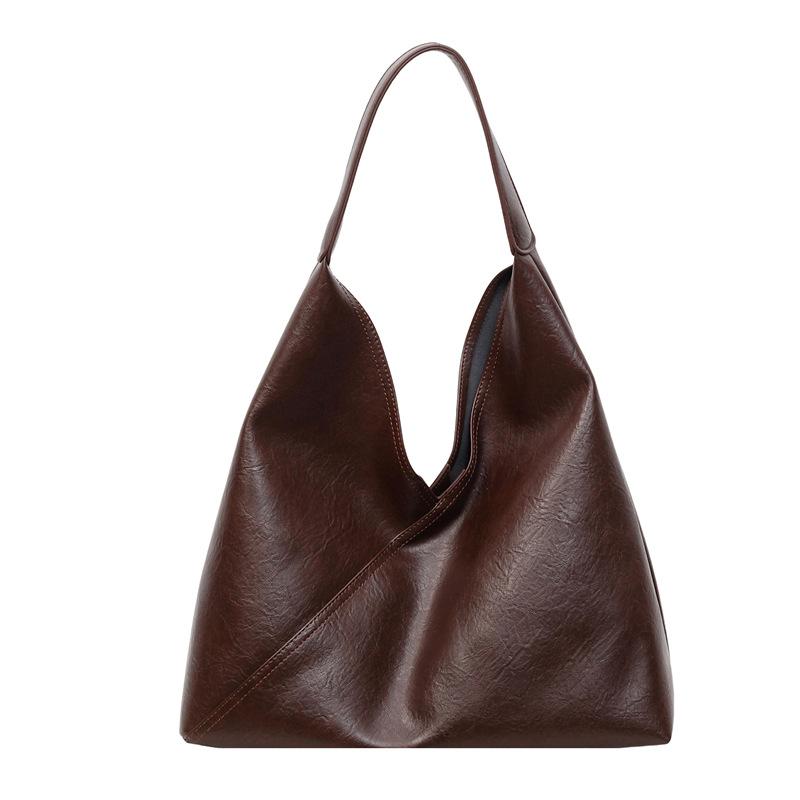 

Retro soft leather bag, tote bag, women s and mother bag, fashionable large-capacity shoulder bag, casual commuter armpit bag.