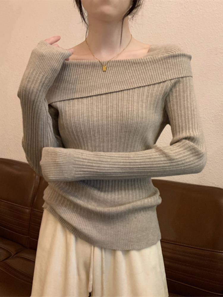 Women's Irregular One-Shoulder Knit Base Layer Top with Collarbone Design, Long Sleeves, and High-Waisted Fit for Spring and Autumn.