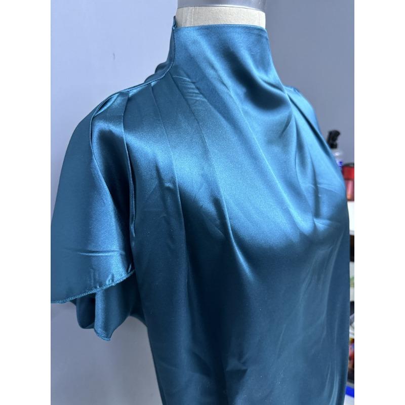 Haut à ourlet asymétrique tendance pour femme pour l'été