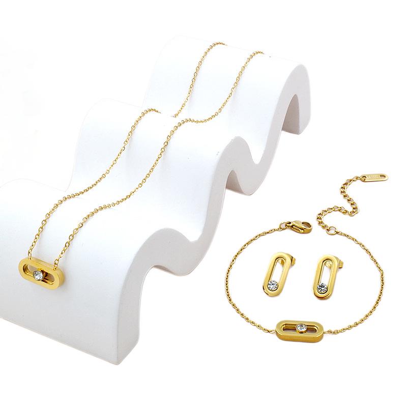 Gold-Plated Titanium Steel Jewelry Set: Necklace, Bracelet, Earrings with Geometric Zirconia - Luxurious and Versatile for Women