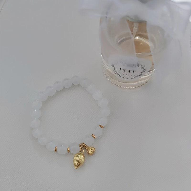 The new Two Worlds Huan bracelet is not colored, jade beads step by step, lotus flower, lotus pod bracelet, niche transfer bracelet.