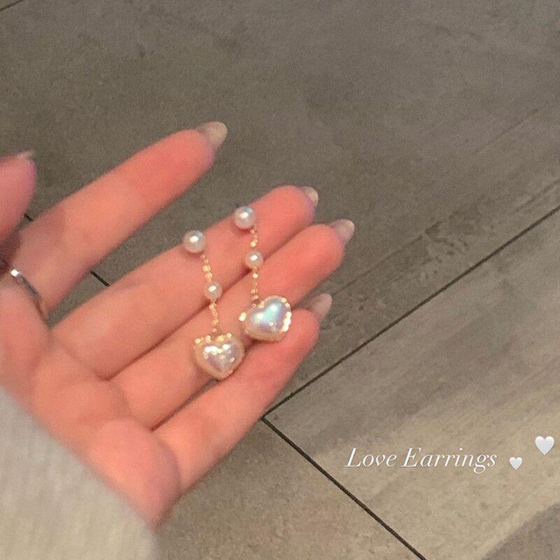 

Pearl love fringed earrings women s stud earrings niche design sense high temperament autumn light luxury simple unique earrings