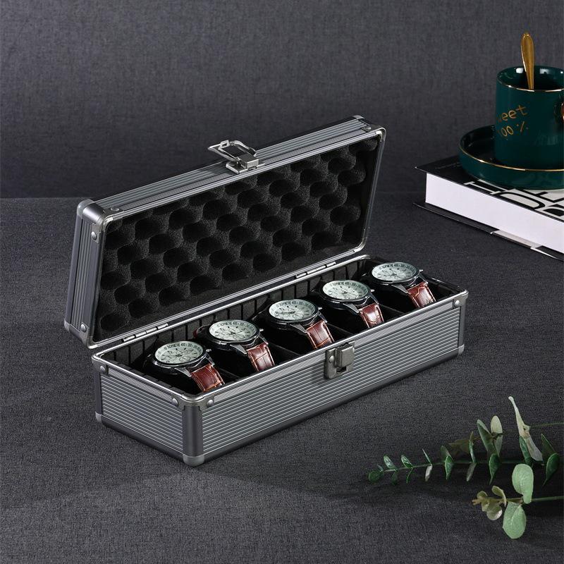 Boîte d'exposition multifonctionnelle pour montres et bijoux en alliage d'aluminium gris fumé avec couvercle transparent