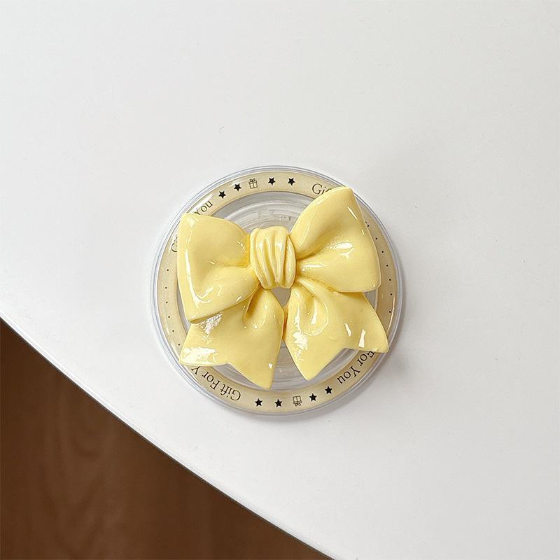 

Magnetic Bowknot Phone Stand: Retractable Airbag Design for Hands-Free Viewing