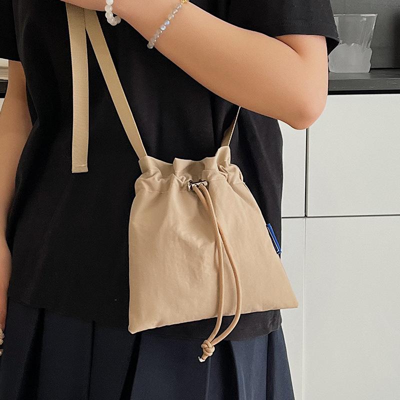 Spring and Summer Korean Ins Style Casual and Light Drawstring Mobile Phone Bag Niche Versatile Sports Travel Messenger Nylon Bag