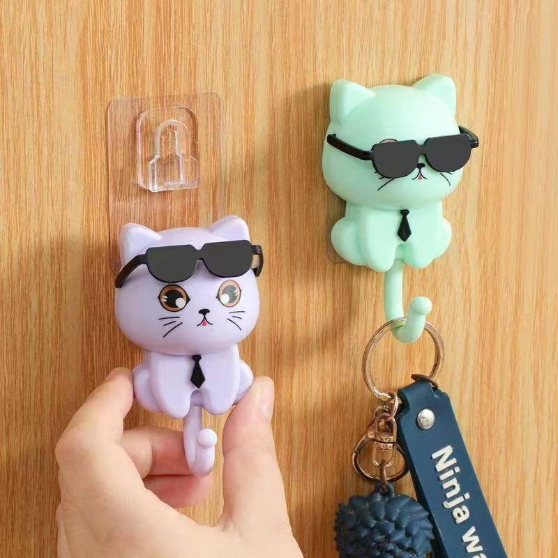Creative Cartoon Wall-Mounted Adhesive Hook for Coats, Hats, Keys, and Sunglasses.