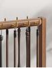 Solid Wood Calligraphy Brush Holder: Desktop Pen Rack with Scholar's Treasures Ornament and Metal Hook Design.