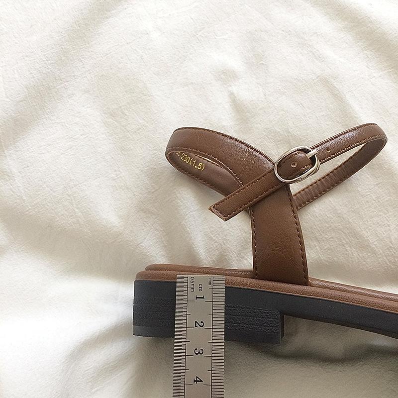 Small foot skirt with bag head, hole shoes, sandals, women's summer belt 2025 flat bottom one word niche shoes retro