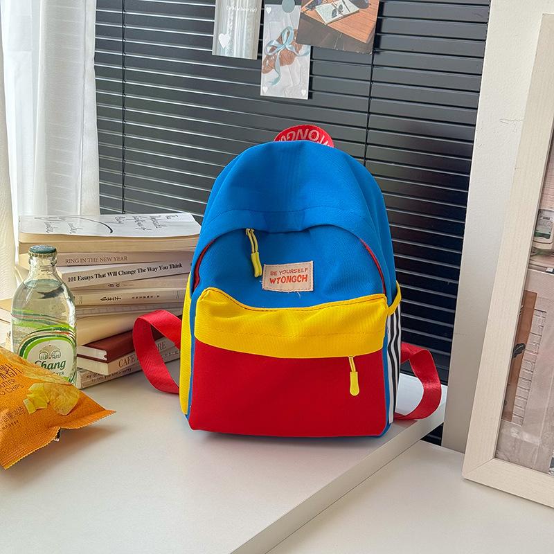 

School bag bag fashion color matching boys backpack large capacity baby school bag medium and large class girls school bag синій