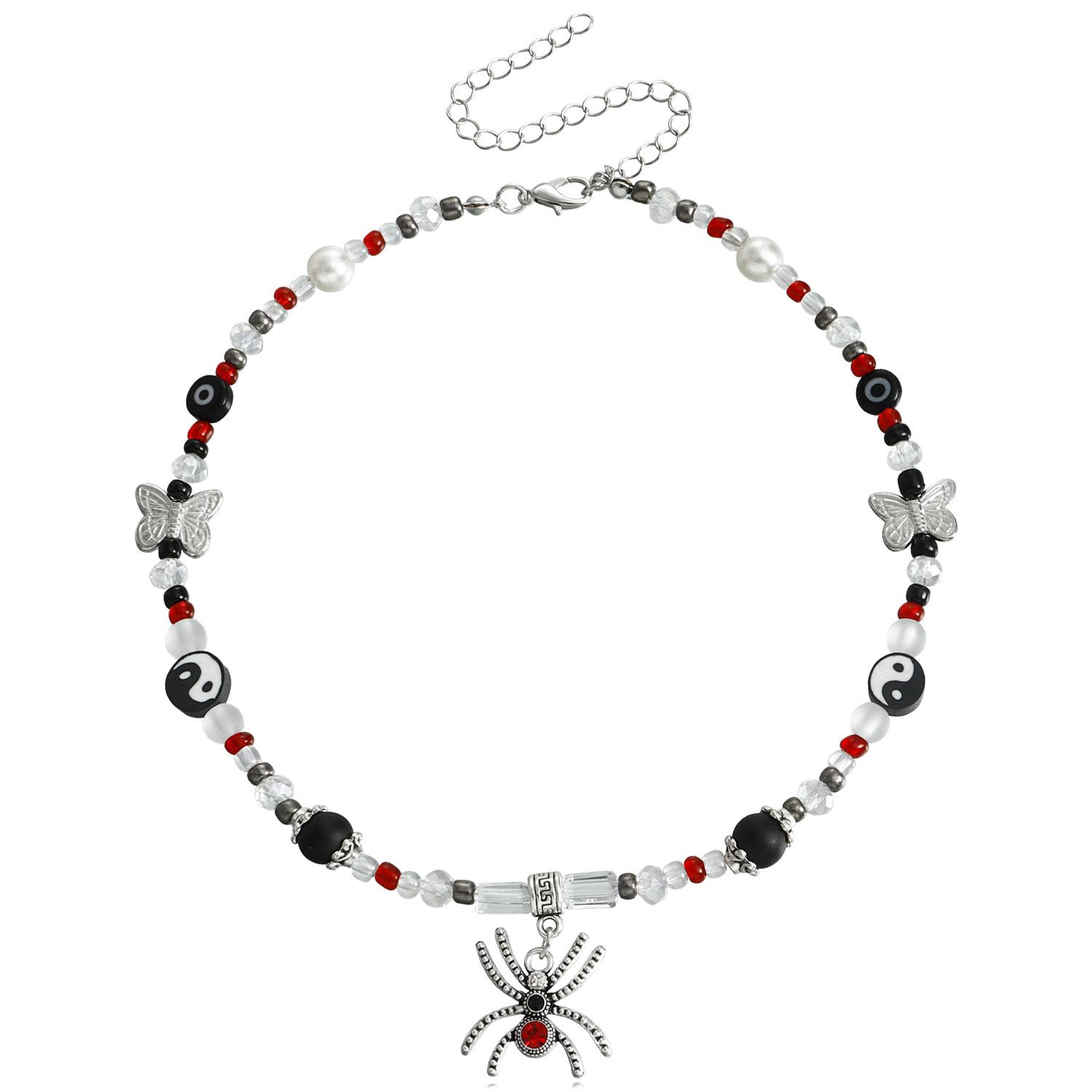 

European and American jewelry non-mainstream creative black and white cold wind ruby diamond-encrusted spider model pendant necklace female