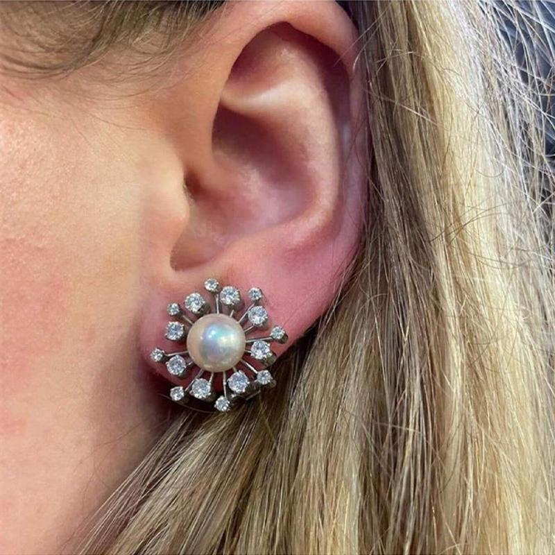 European and American fashionable women's simple snowflake pearl earrings, flower cute temperament, versatile earrings