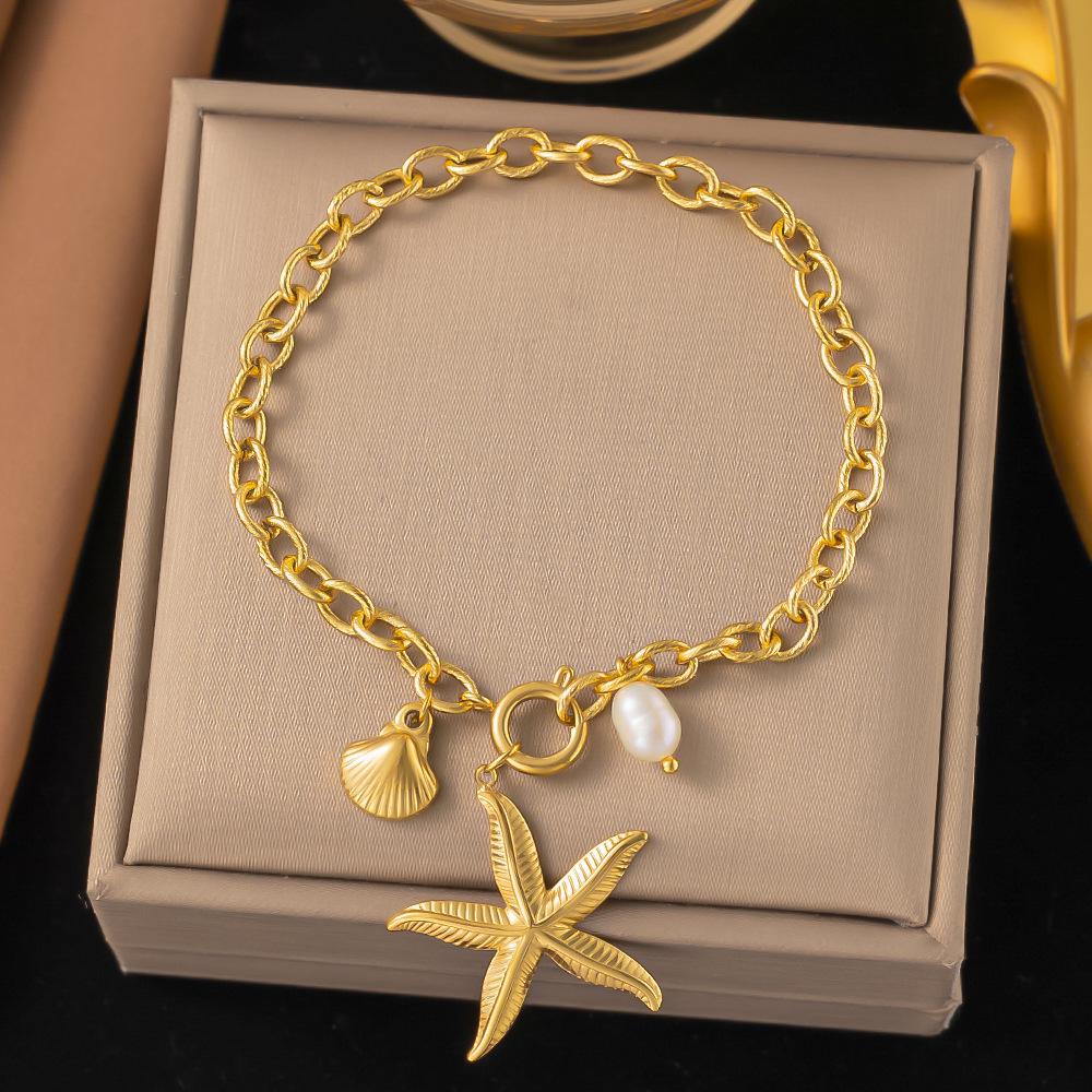 Preferred Bracelet 2: Qi Yun Fashionable Stainless Steel Cross Bracelet - Trendy, Statement, Light Luxury Jewelry.