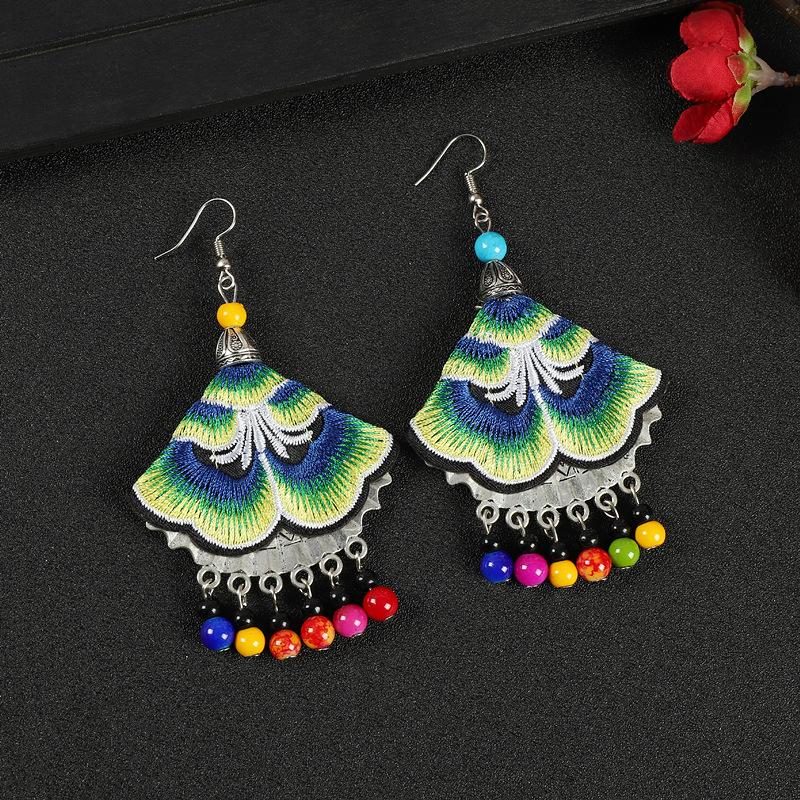A few embroidered fabric earrings, long tassel personalized fan earrings, women's retro Miao flower earrings