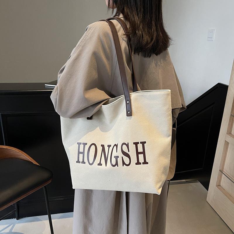 Large capacity canvas simple shoulder bag female college student casual fashion simple tote bag hand carry portable commuter bag