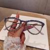 New European and American metal cat eye glasses women's high sense small broken diamond fashion *** light glasses