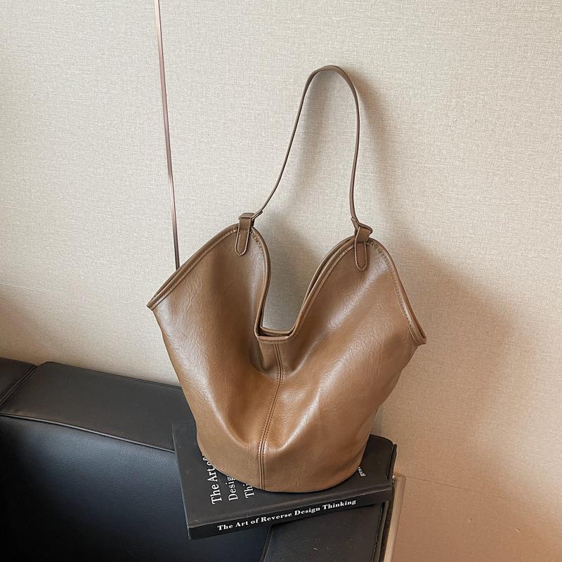 

Сегодняшние популярные сумки, новые летние текстурные нишевые наплечные сумки, универсальные сумки-мессенджеры, сумки-ведра