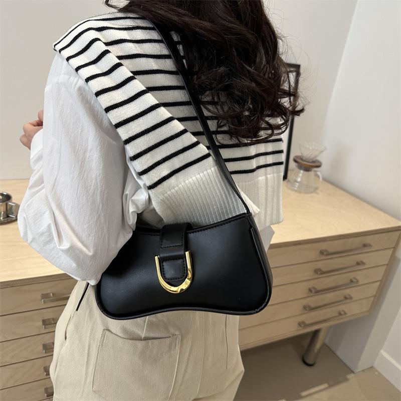 Niche high-end women's bags, fashionable retro shoulder messenger bags, simple underarm bags with simple texture