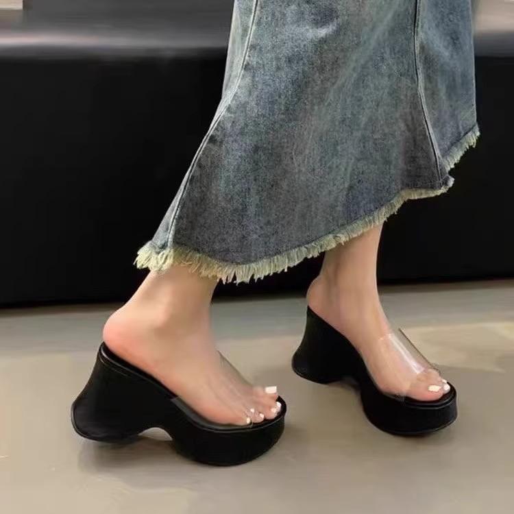 sponge cake thick bottom slope heel cool slippers women's summer wear fashion 2025 new high-end fairy wind transparent one-word drag
