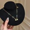 Qi Xing Qing Lan Enamel Gold Pendant Clavicle Necklace – New Chinese Style, Light Luxury Choker for a High-End Fashion Statement