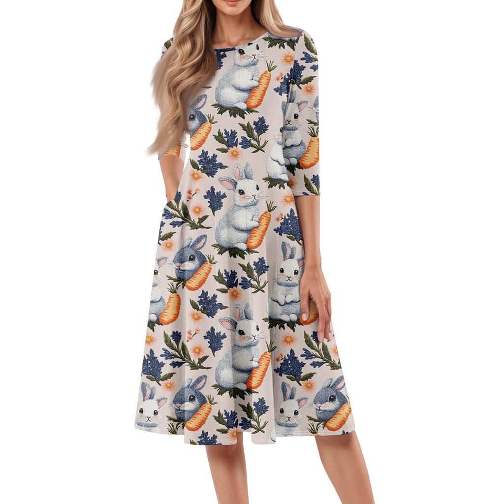 Dámské volné ležérní a módní šaty střední délky s potiskem, kulatým výstřihem a sedmčtvrtečními rukávy