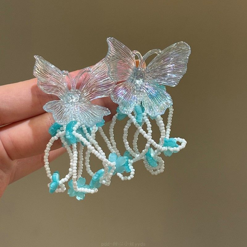 

Butterfly pearl flower fringed earrings temperament versatile stud earrings light luxury high sense niche earrings women