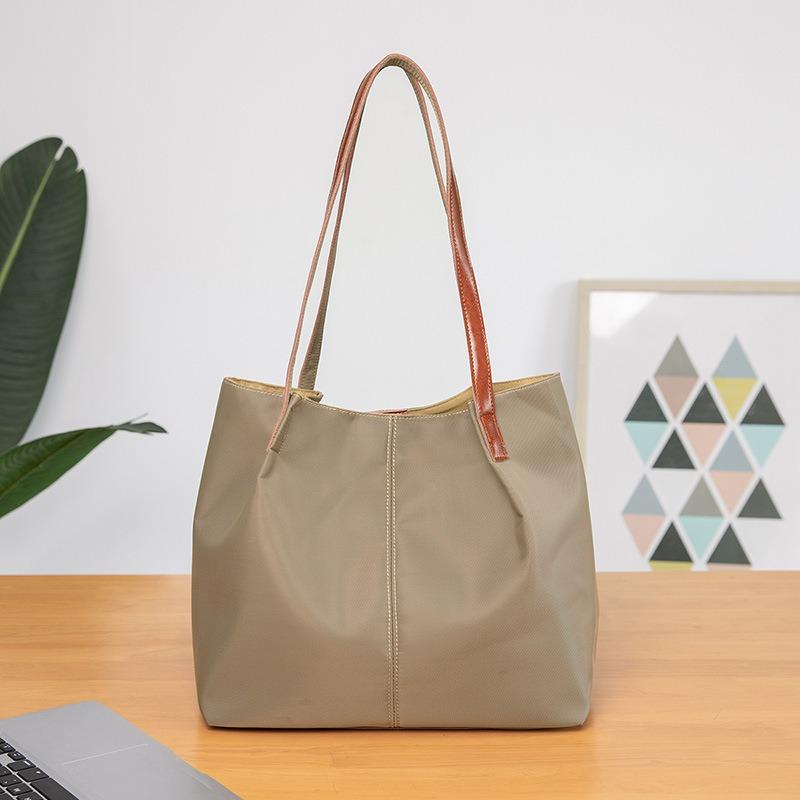 Guangzhou canvas handbag leather bag plus new nylon Oxford cloth handbag large capacity shopping bag