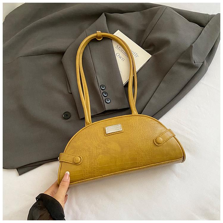 

This year, Korean niche crocodile pattern underarm Boston bag temperament, foreign style, personalized commuting shoulder women s bag is popular. коричневий