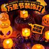 Halloween Scene Set: Pumpkin Lanterns, Atmosphere Candles, Ornaments, and Small Toys for Bar or Shop Decor.