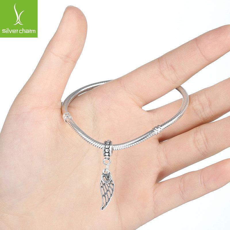 Europäisches und amerikanisches DIY Perlenarmband mit tibetsilberfarbenem Flügel-Herz-Anhänger (PA5296)