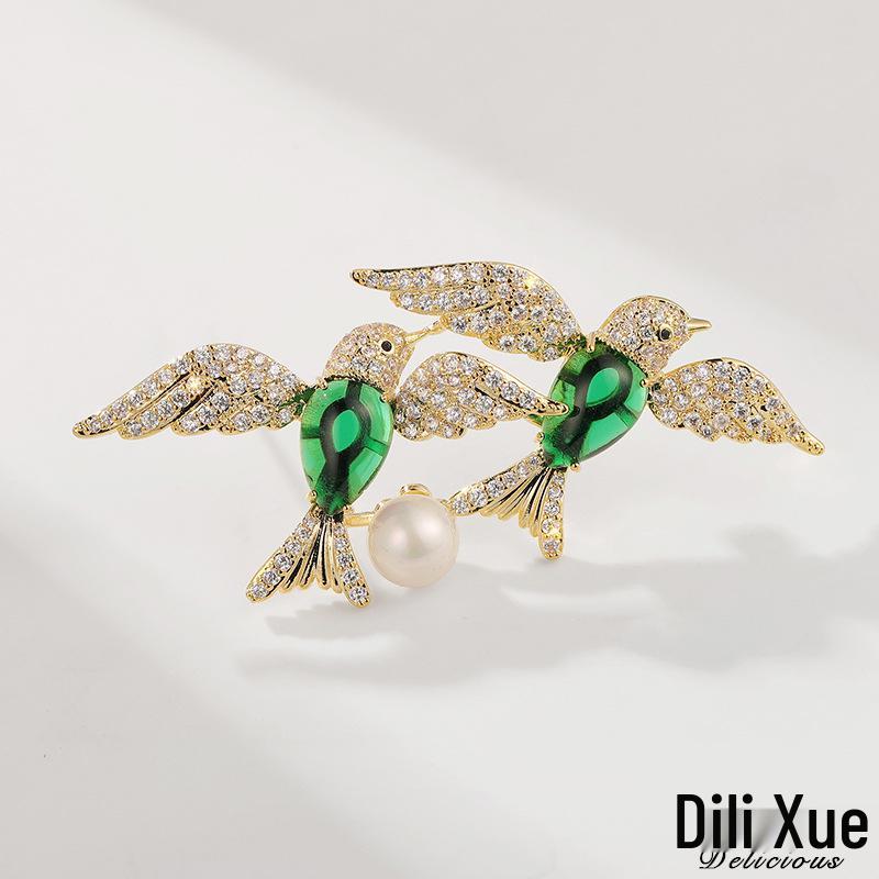

Dilly Snow Green Chalcedony & Freshwater Pearl Lovebird Brooch with Zircon Accents.