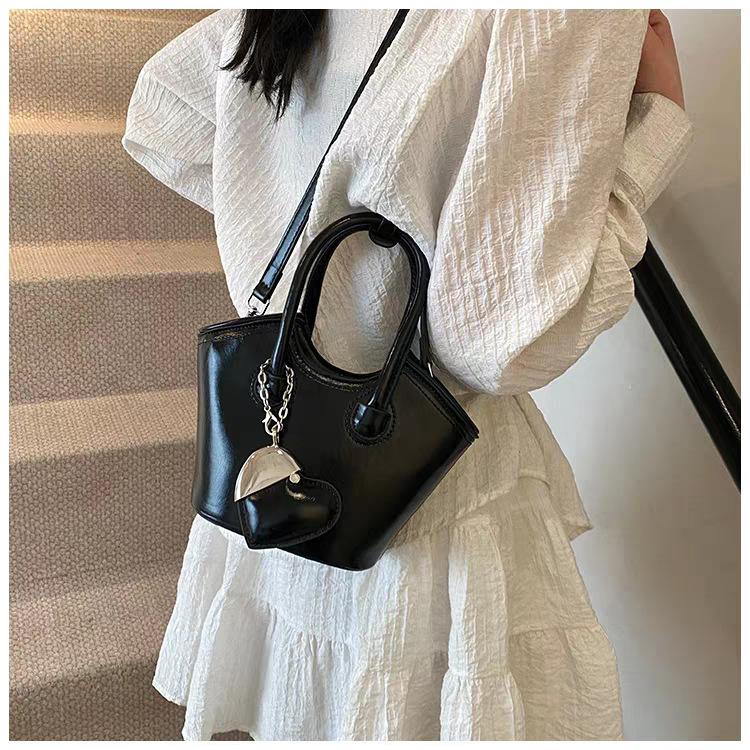 

Hand-carried Simple Casual Bucket Bag Korean Trend All-match Shoulder High-end Niche Cross-body 25x10x16 чорний