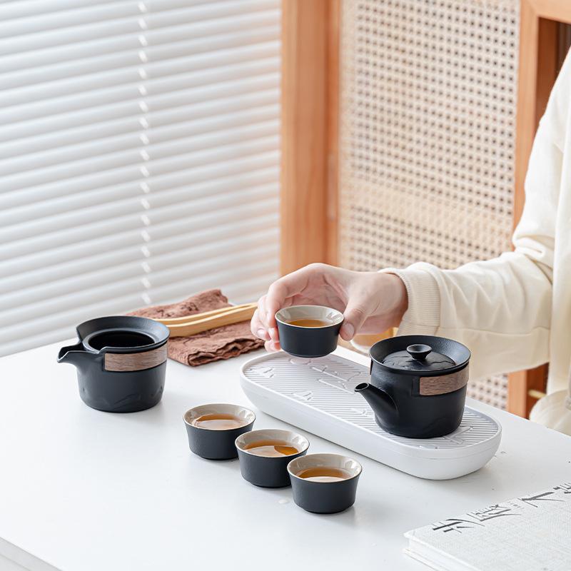 Mugu Landscape, a pot of four cups of travel tea set, a full set of outdoor portable tea sets, the company's annual meeting gift
