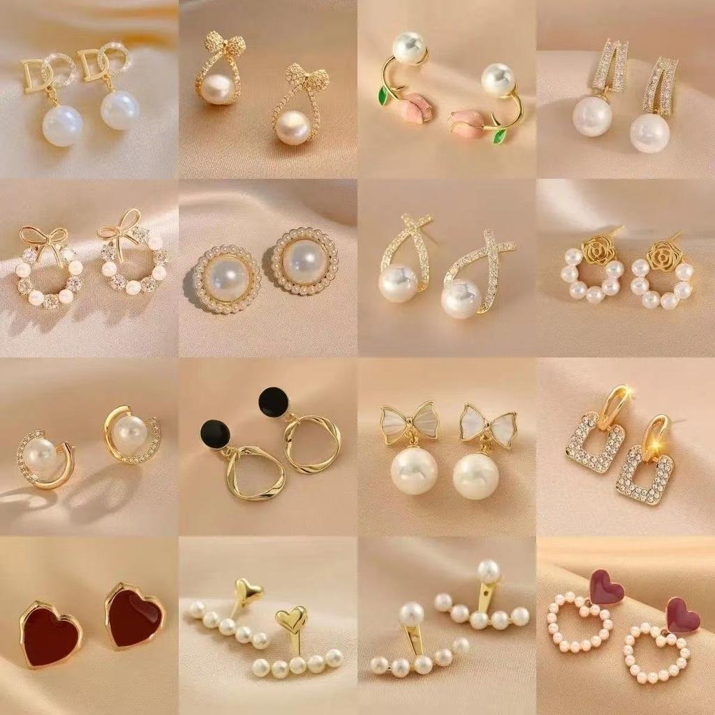 Pendientes de perlas de alta gama de moda Pendientes retro de nicho francés de lujo ligero Pendientes de perlas simples y versátiles para mujer