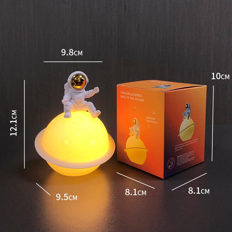 Astronaut Night Light Planet Lamp: Luminous Moon Ornament for Bedroom Decor, Gift, or Souvenir with Silk Flower.