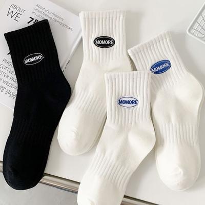 Calcetines de tubo medio para hombre Otoño e invierno Calcetines blancos absorbentes del sudor y desodorantes Calcetines deportivos para hombre