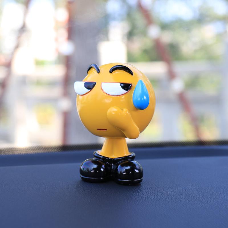 Ha Hu Emoji Bobblehead Car Ornament: Cute Cartoon Interior Decoration.