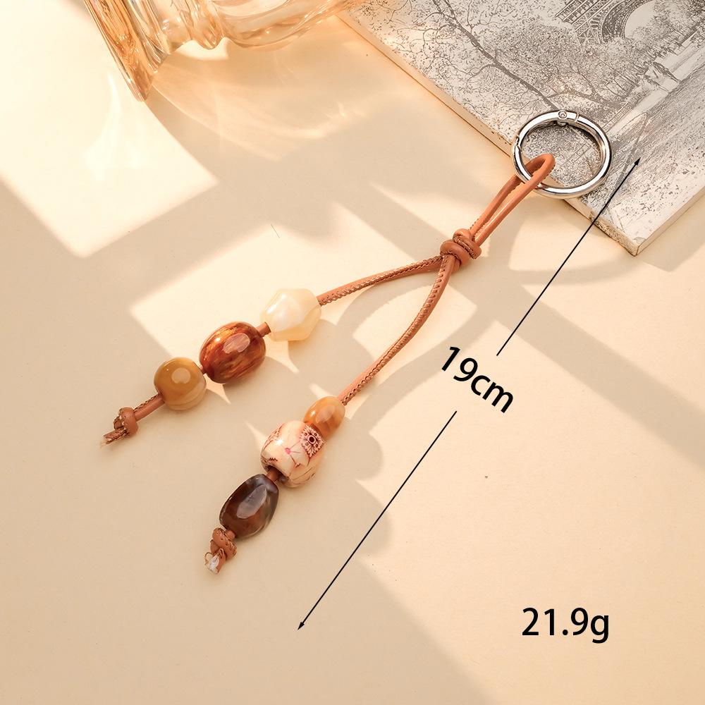 

1Pcs Acrylic colored bead mobile phone hanger - Retro handcrafted hanger