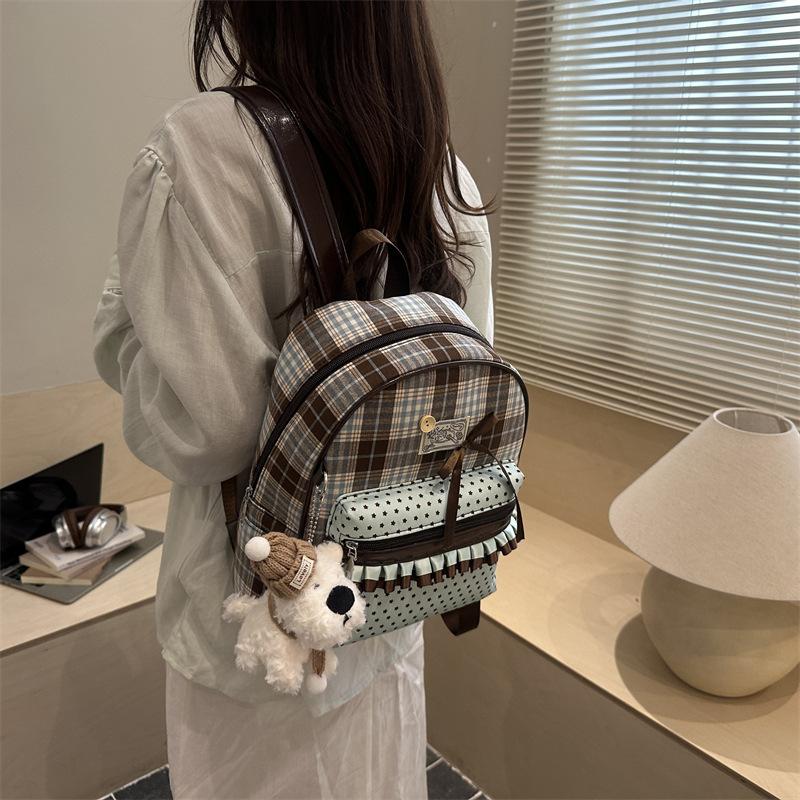 Schoolbag Korean girl plaid corrugated backpack women's 1011 new cute bow backpack large capacity student schoolbag
