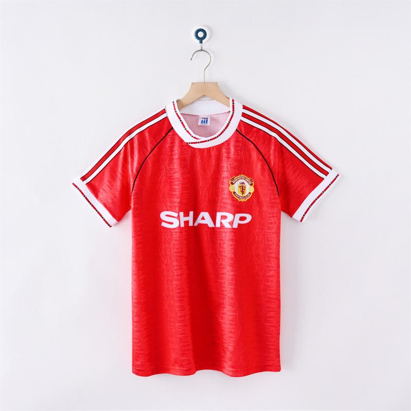 Manchester United Retro-Trikots Sporttrikots gibt es in verschiedenen Stilen, und das WM-Fußballtrikot ist ein Haarhersteller.