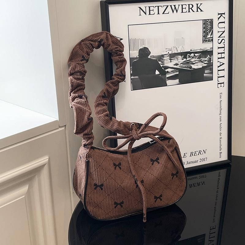 

Сладкий бант клетчатая сумка-полумесяц на одно плечо подмышку 2025 осень новая простая повседневная большая вместимость коричневый