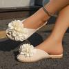 2025 summer hollow Korean version flat bottom outer wear half slippers women's flower casual bag head solid color slippers
