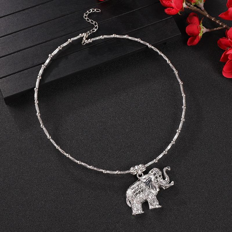 Vintage tassel collar hollow flower seedling silver pendant necklace niche personality collarbone chain women