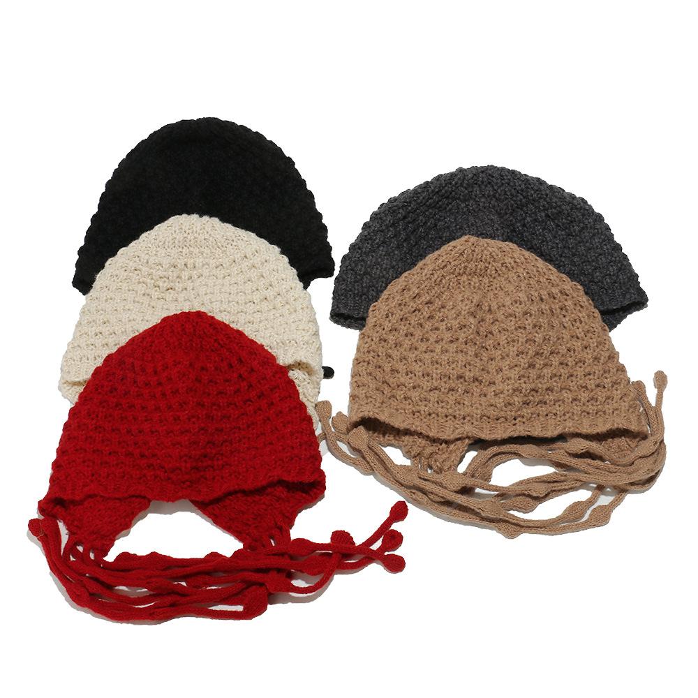 Autumn and winter warm wool hat, hand-woven hollow bag head hat, women's ethnic style fringed ear protector, knitted hat, women