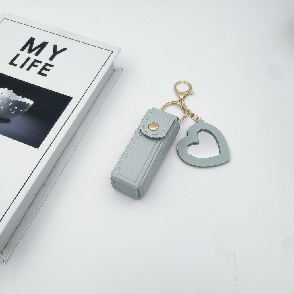 Přenosné pouzdro na rtěnku ve tvaru srdce s ochrannou kůží a roztomilou klíčenkou s přívěskem