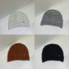Simple knitted crimped stacking hat women's autumn and winter new face small versatile atmosphere wool hat
