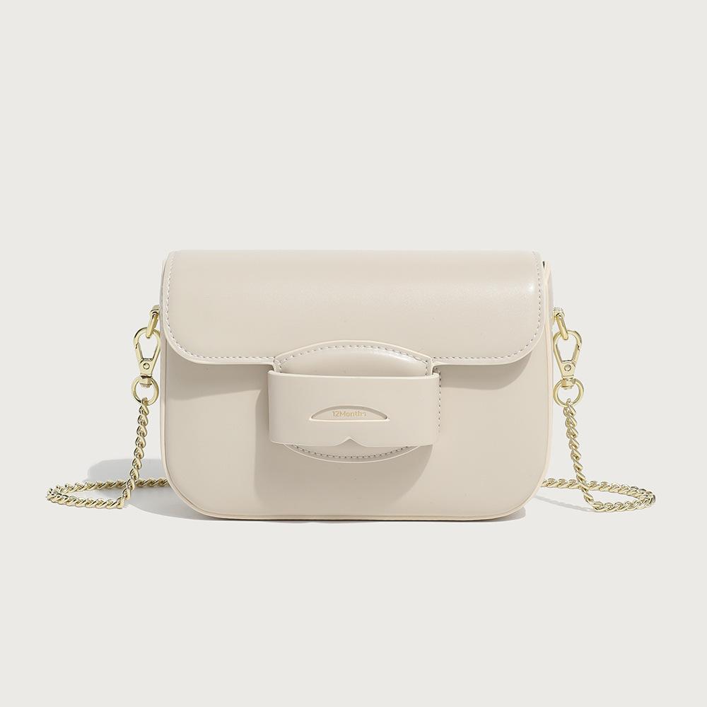 Niche design bag spring women's versatile fashion high-end exquisite messenger bag saddle tofu small square bag