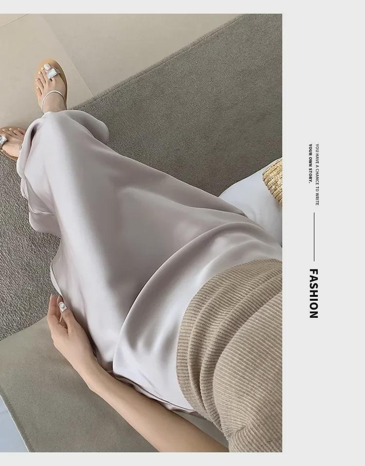 Högmidjekjol i satin med fisksvans – Vår/Sommar 2025 Kollektion