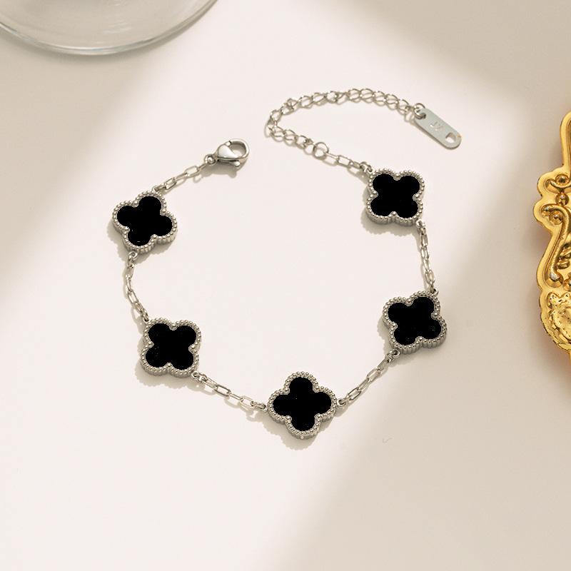 Bracciale di alta moda in acciaio al titanio con quadrifoglio a quattro foglie double-face per donna, stile elegante