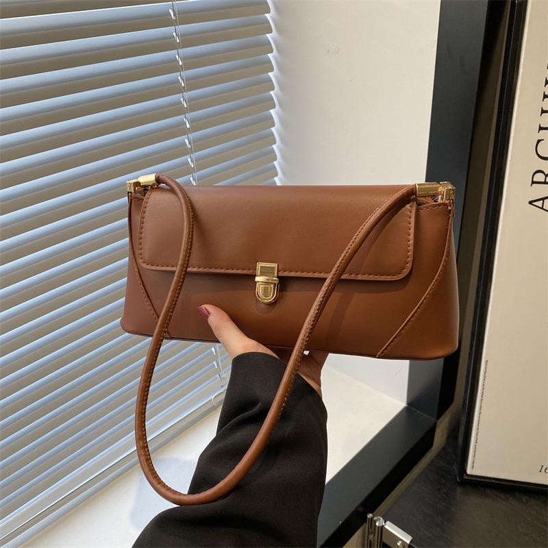 

Новая сумка-багет нишевого дизайна, высококлассная, простая, ретро, подмышечная сумка, текстурная сумка через плечо, женская коричневый