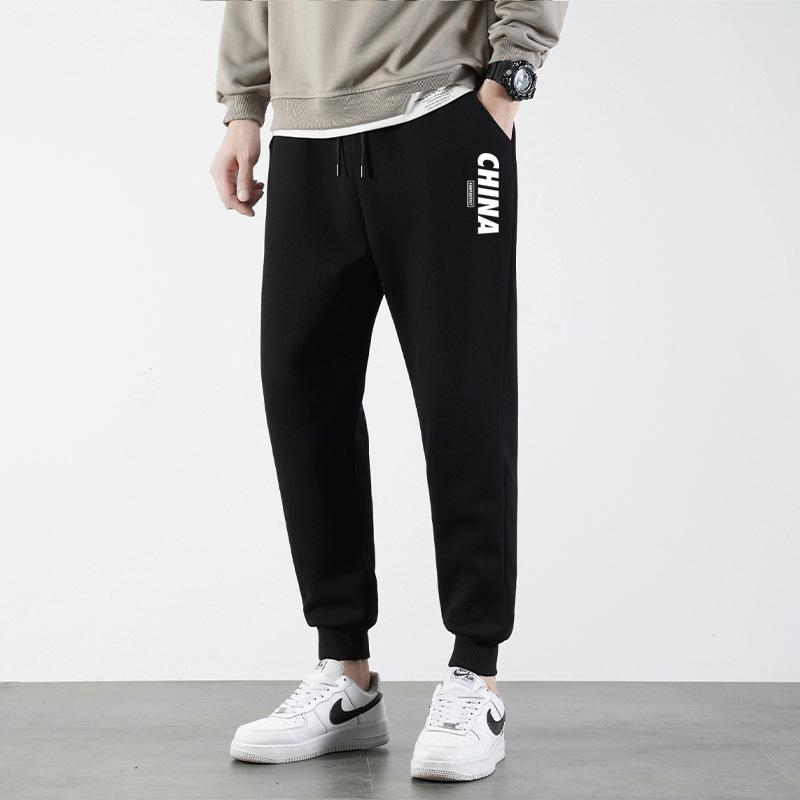 Pánské ležérní kalhoty letní a podzimní tenké velké velikosti volné pohledné módní trendy potištěné se stahováním u kotníků devítibodové tepláky